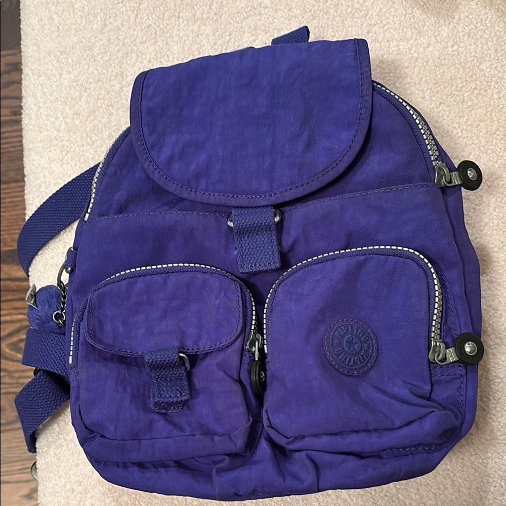 Kipling mini purple backpack. 10x9
